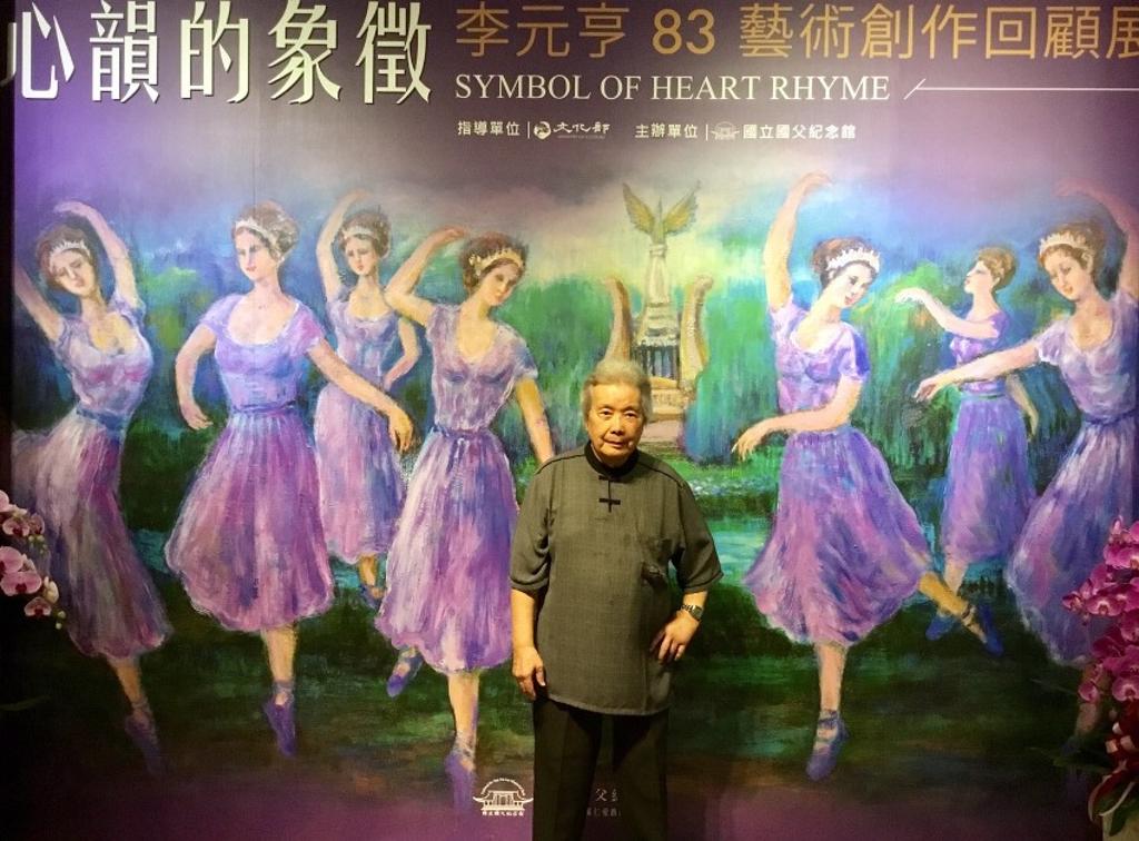 李元亨與其油畫作品「田園舞曲」。圖／許俊揚