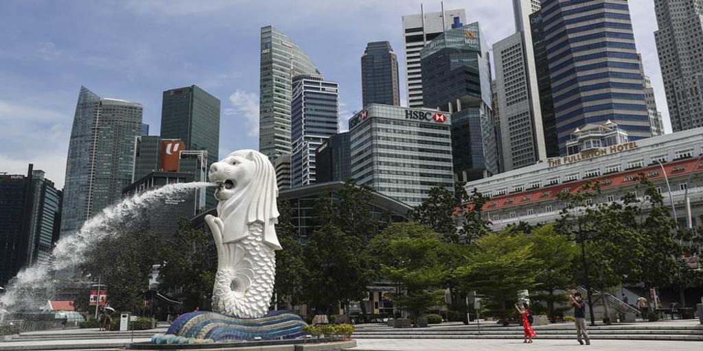 新加坡金管局報告提到，新加坡就業市場的復甦可能「不平均且牛步化」。圖／美聯社