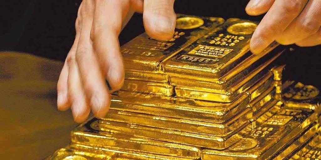 隨著美國放慢然後最終停下升息步伐，黃金價格可望在今年漲破每盎司2,000美元大關，並創下歷史新高。圖／本報資料照