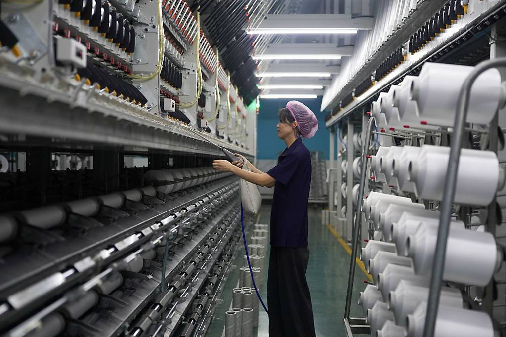 大陸元月製造業PMI 降至49.3